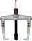 Metallic two-arm puller for removing bearings and gears, with screw and adjustable arms.