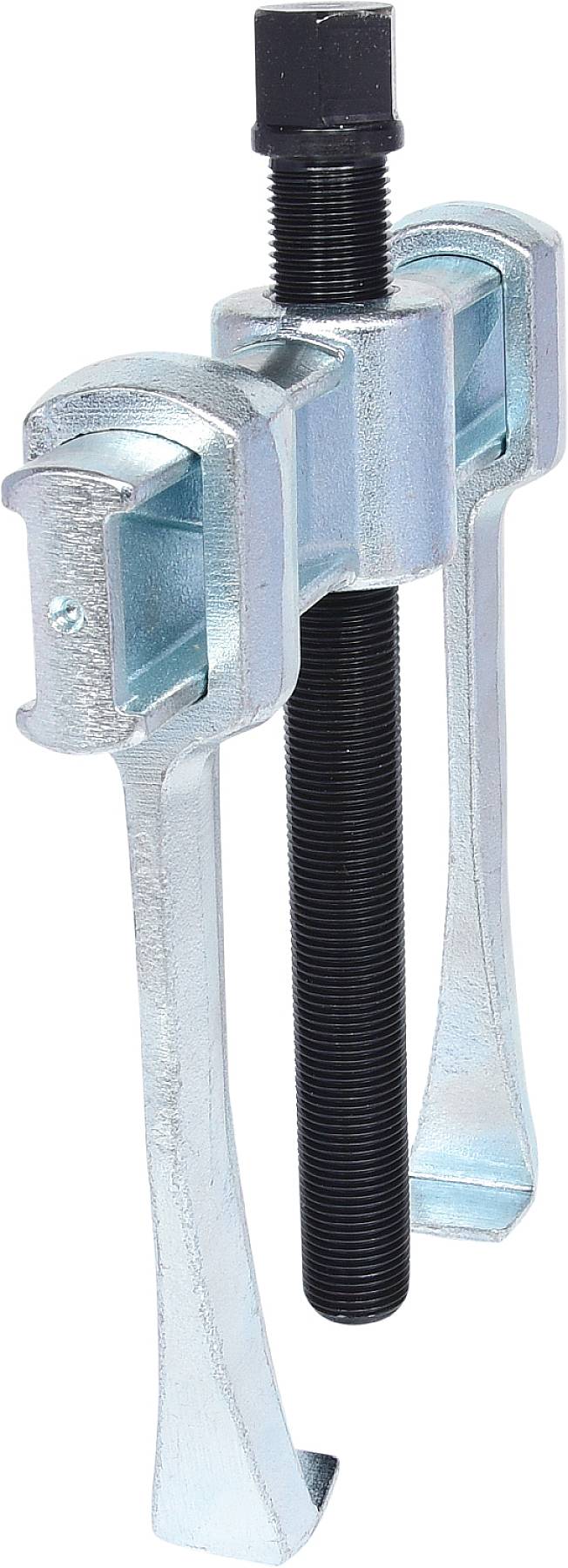 Two-legged metal puller with a black, ribbed screw in the centre, used for removing bearings or gears.