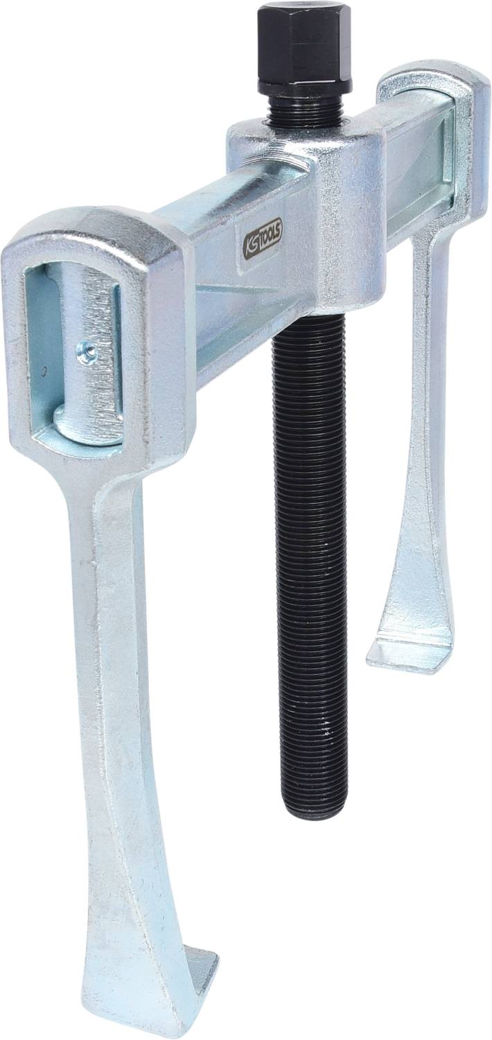 Two-arm metallic puller with a central threaded rod, used for removing bearings or gears.