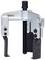 Tool for dismantling bearings or gears, consisting of a frame with adjustable arms and a central screw.