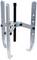 Metal puller with three adjustable arms, suitable for removing gears or bearings from shafts.
