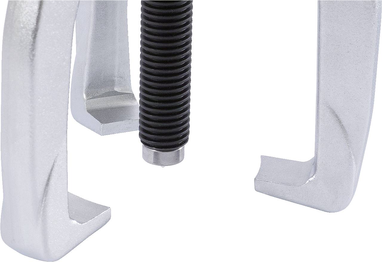 Close-up of a screwdriver with a serrated metal handle and silver prongs gripping a tool or object.