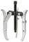 A mechanical puller with three hooks for removing bearings or gears. Silver hooks with black spindle screw.