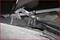 A windscreen wiper removal tool is used on a car windscreen to remove the wiper arm.
