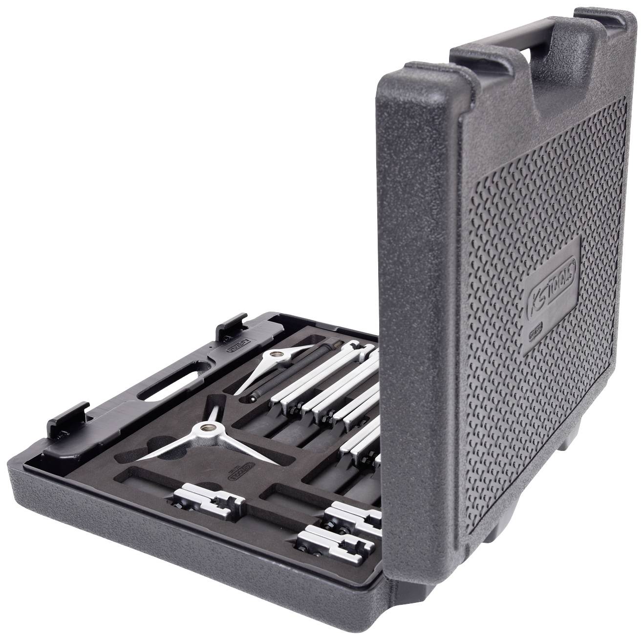 'An open, black hard plastic case contains precise drawing tools such as compasses and spare lead holders, organised in pre-moulded compartments.'