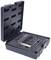 An open toolbox with various metal tools and attachments nestled in a custom-shaped foam insert.