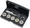 A set of screw cap removers in an open black box, with various sizes and a metal insertion tool.