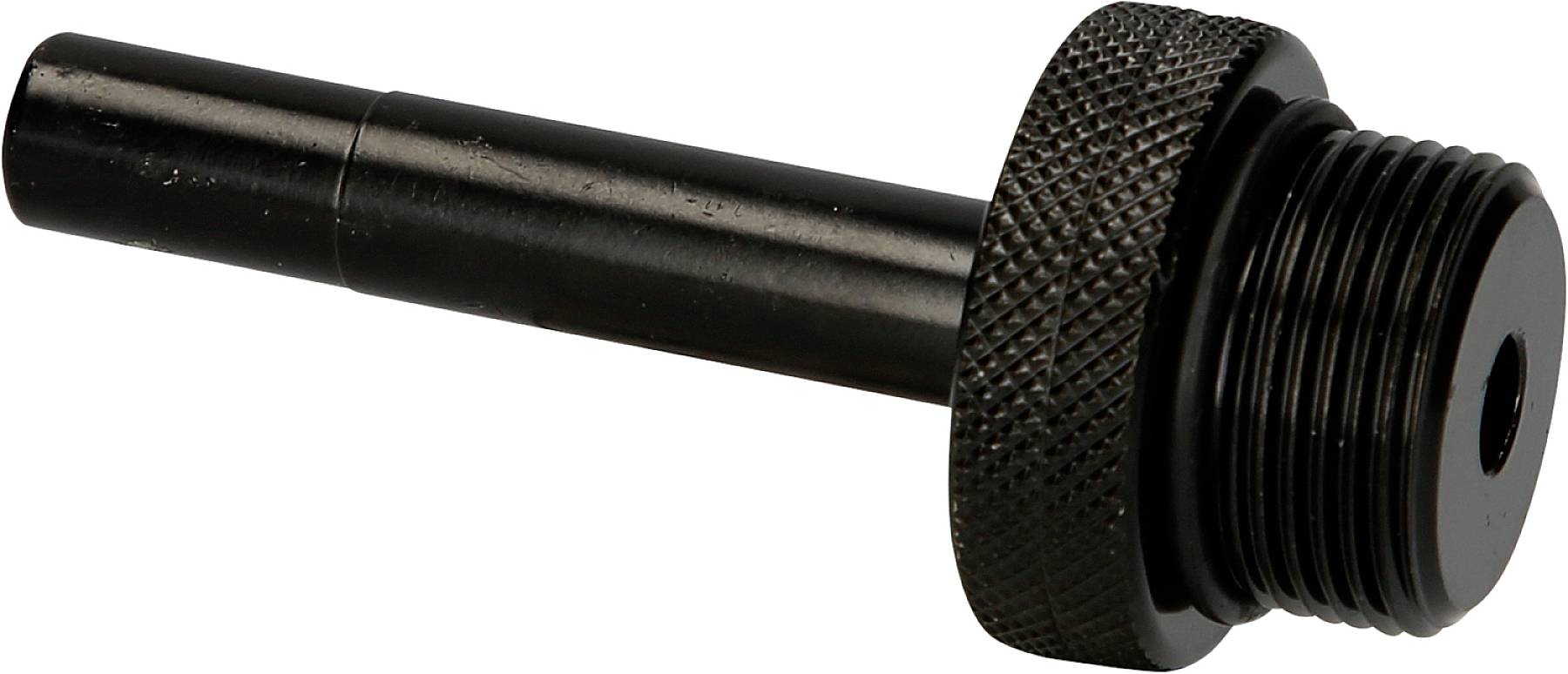 A black metal adaptor with a knurled handle and a long, cylindrical end. Used for machine connections.<br><br>Note: I used "adaptor" instead of "adapter" as this is the preferred British English spelling.