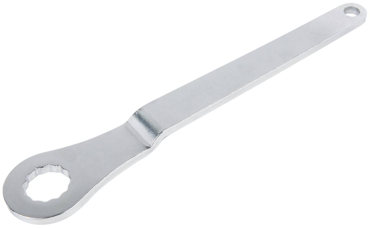 A silver spanner with a round, toothed end for gripping nuts.