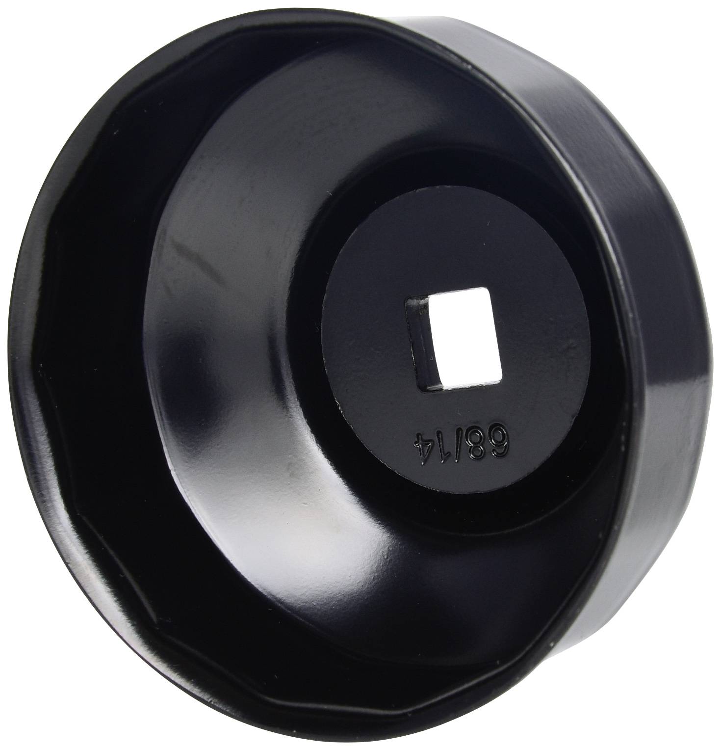 A black tool, an oil filter socket adapter, round with a square opening in the centre, for dismantling oil filters.