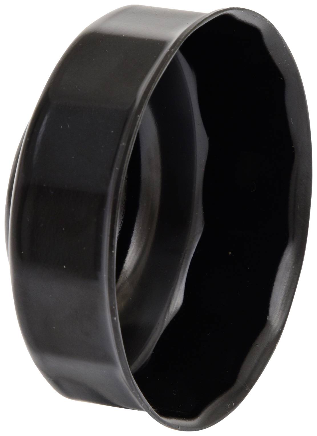 Black plastic oil filter cap with a slightly domed shape and serrated edge, suitable for automotive oil filter replacement.