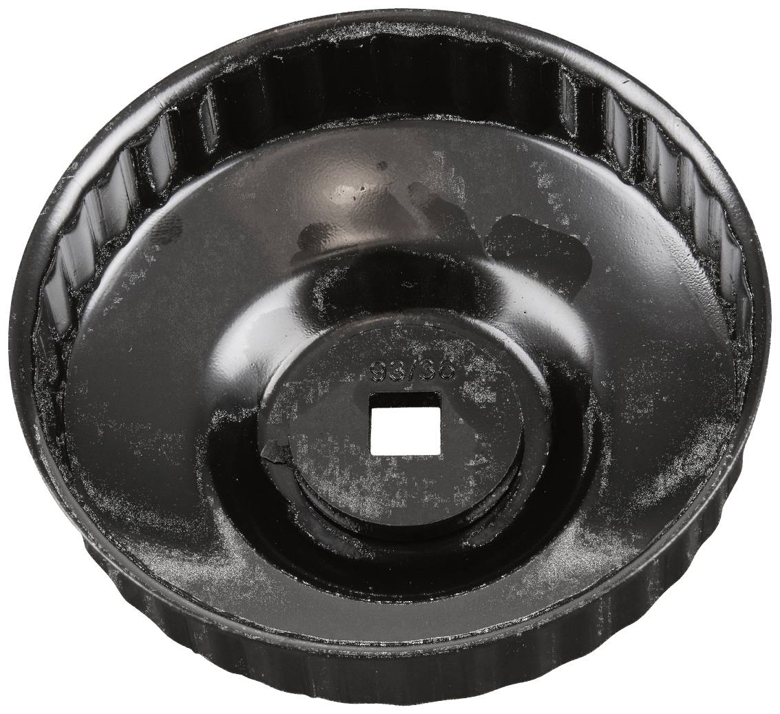 Black, round metal tool with a gear-like structure around the edge. Used for removing oil filters from vehicles.