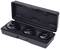 Black plastic case with open lid, containing three black adapters of different sizes in equally black recesses.