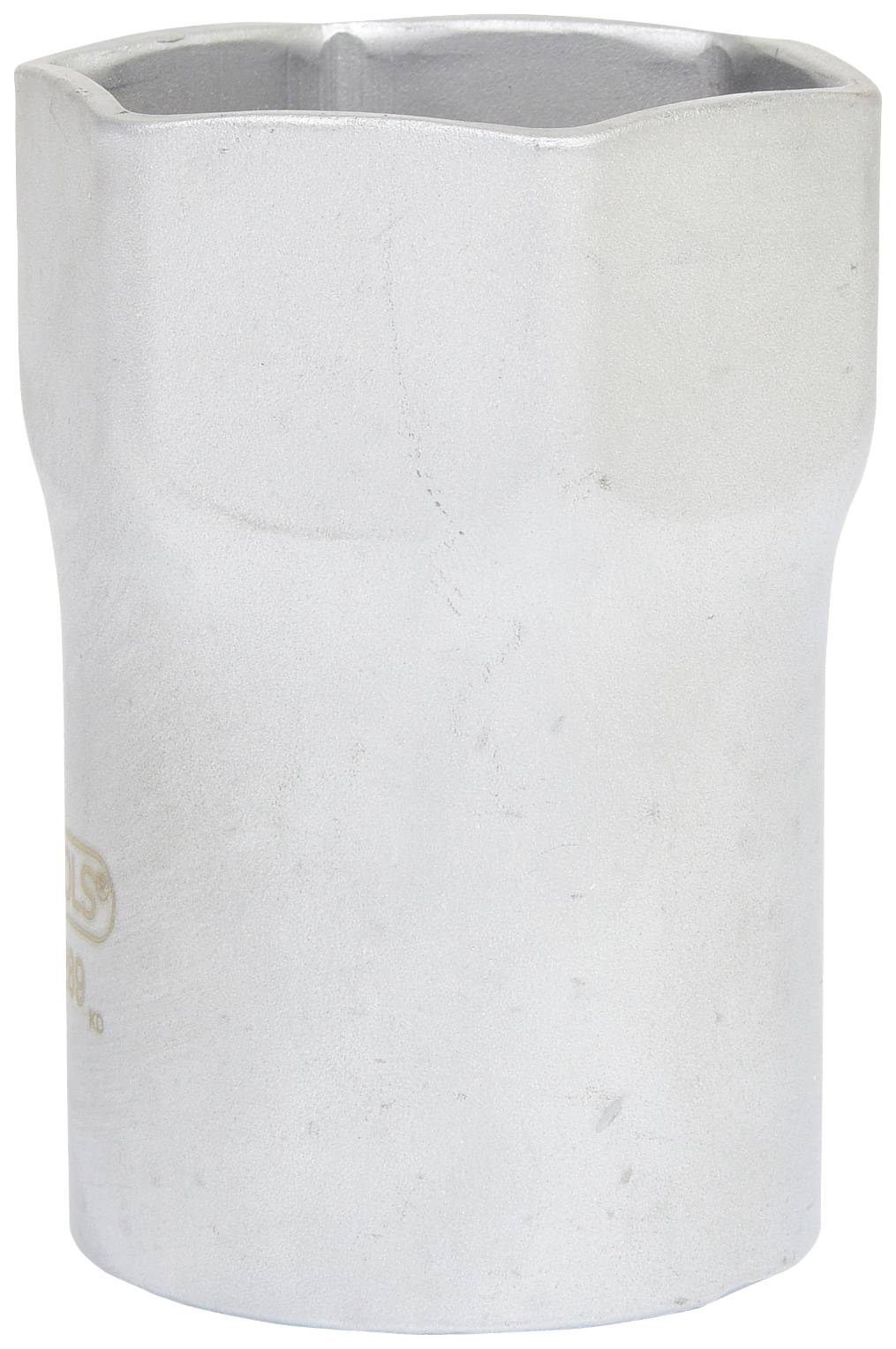 A silver socket wrench, cylindrically shaped, is shown standing on a surface. It has a hexagonal opening at the top.