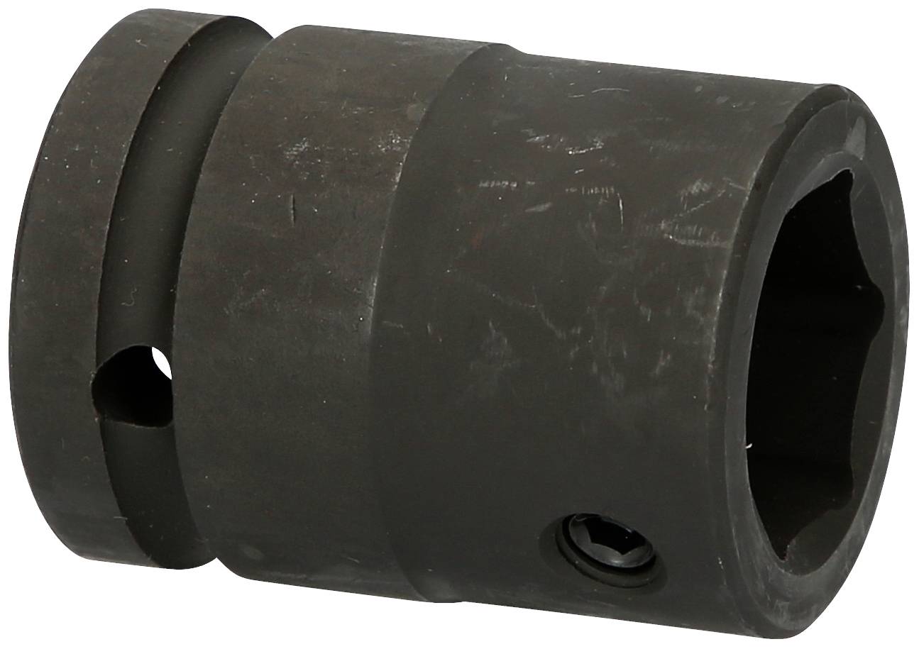A black metal socket, cylindrically shaped, used for mechanical work, against a white background.