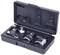 An open toolbox with several socket wrench inserts and an adaptor, all shiny and metallic, seated in moulded holders.