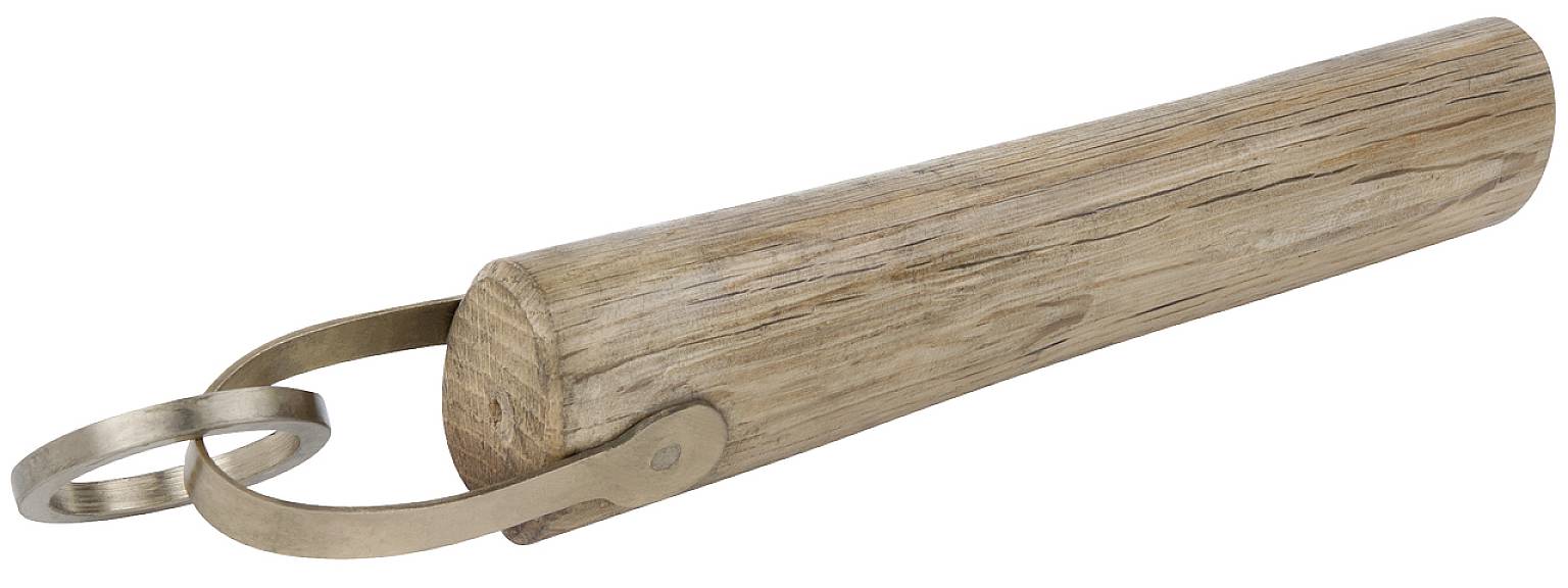 Wooden pestle with a metal ring handle, used for processing workpieces or materials in craft work.