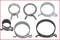 Six different shuttlecocks in a grey and black colour palette, arranged in two rows on a white background.