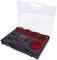 Hole saw set in an open case with various sizes of red hole saws and accessories. Suitable for craftwork.