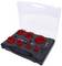 Drill core bit set in an open plastic case. Contains various red drill core bit attachments and accessories on black foam.