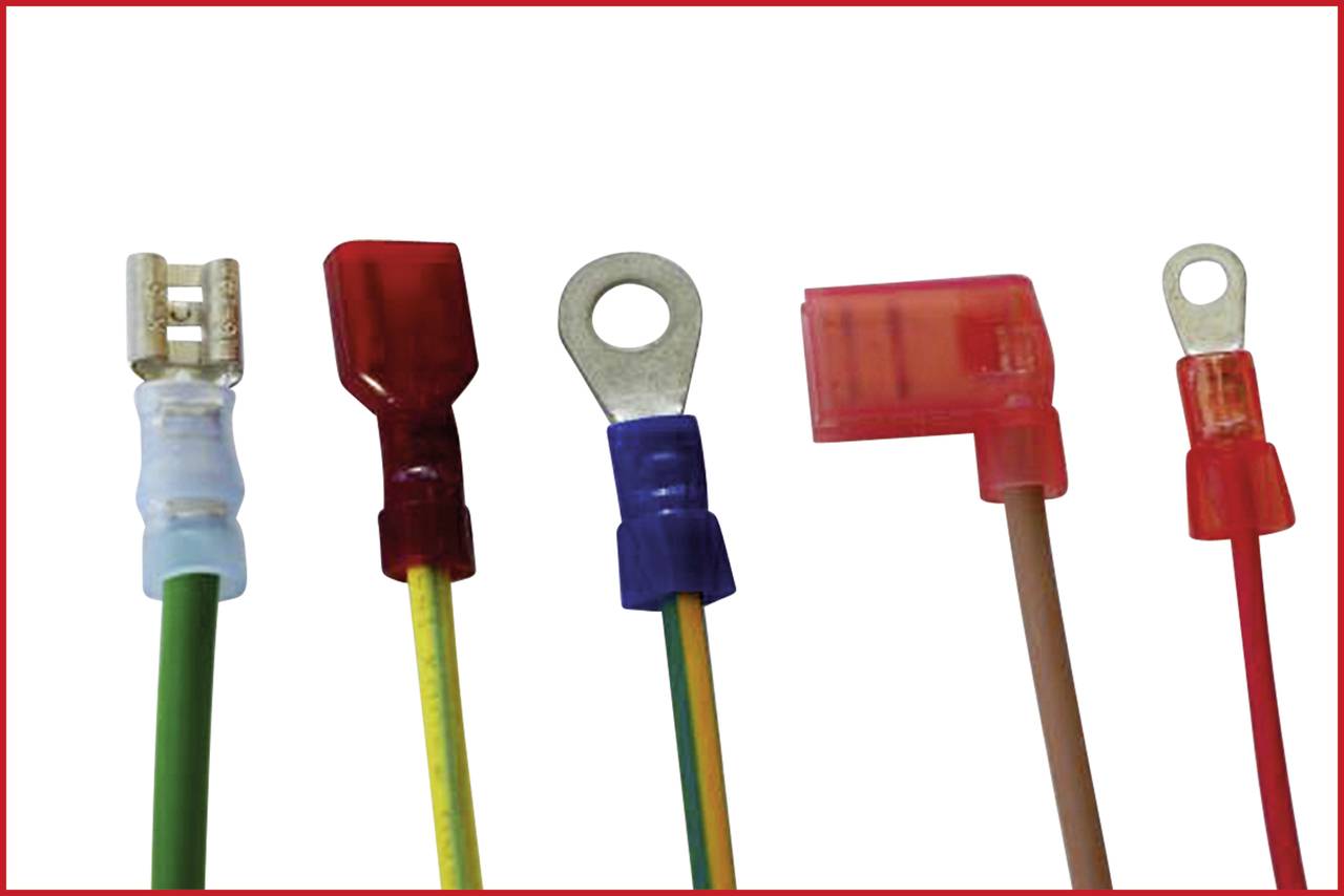 Five different cables with colourful plastic sheaths and metal ends, representing various cable connection types.