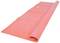 Red yoga mat rolled out on a white background, ready for fitness exercises or meditation.