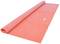 A rolled-out pink exercise mat on a white surface.