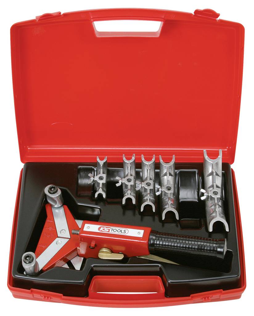 A red toolbox with a jointing press and six metal attachments, used for securing corner joints.