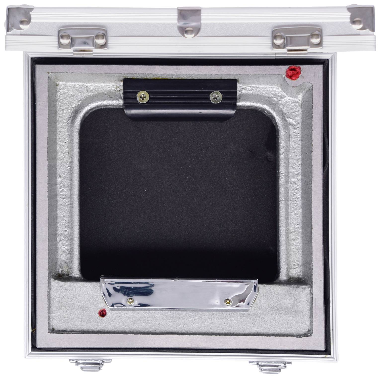 A square metal case with an open lid, revealing a recessed black interior with a grey frame and red details.