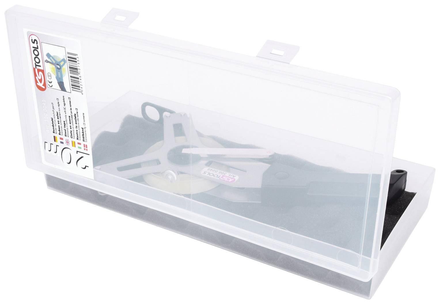 A mechanical tool in a transparent plastic box, labelled with 'KS Tools'. The box contains an adjustable measuring instrument.