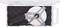 'Measuring tape in an open plastic case. Metal measuring tape with a crank handle and hook.'