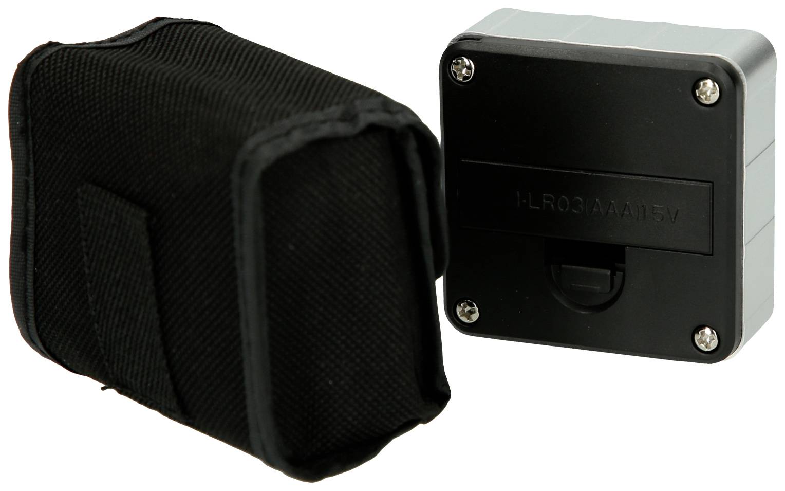 A black bag is lying next to a rectangular, black plastic device.