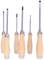 Six screwdrivers with wooden handles are lined up side by side. They vary in size and tip type.