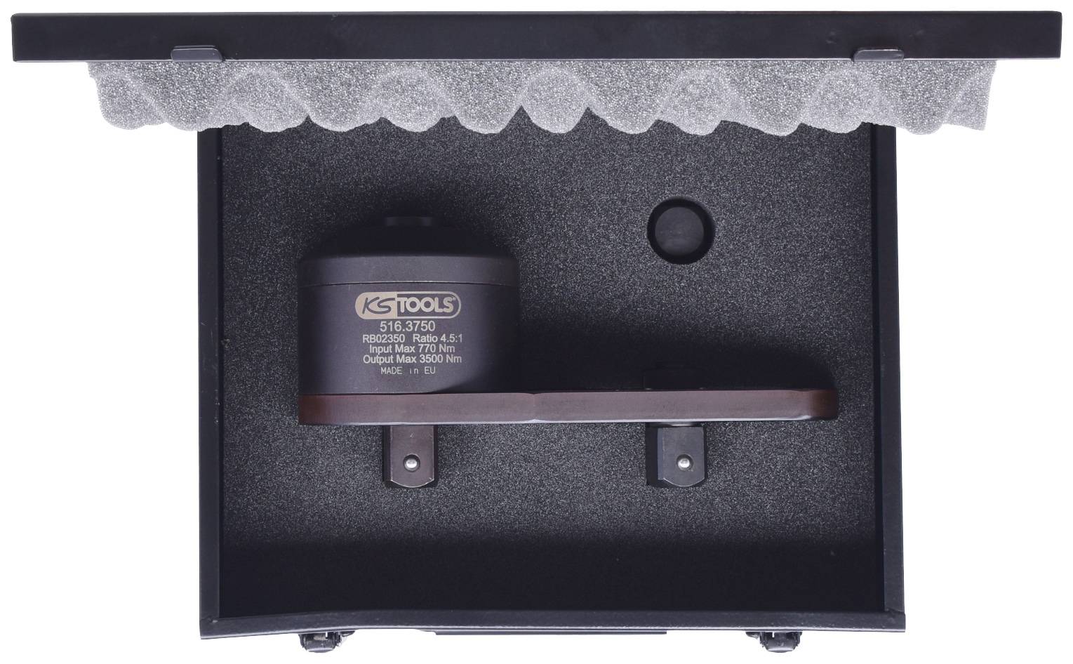 A black case with a KS Tools device and a tray. The interior is lined with foam for protection.