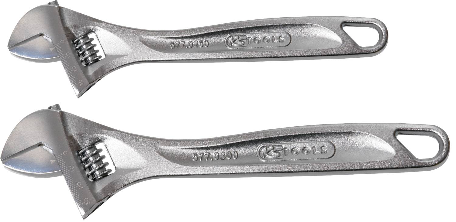 Two adjustable metal spanners lying side by side. Both have a silvery, gleaming surface.