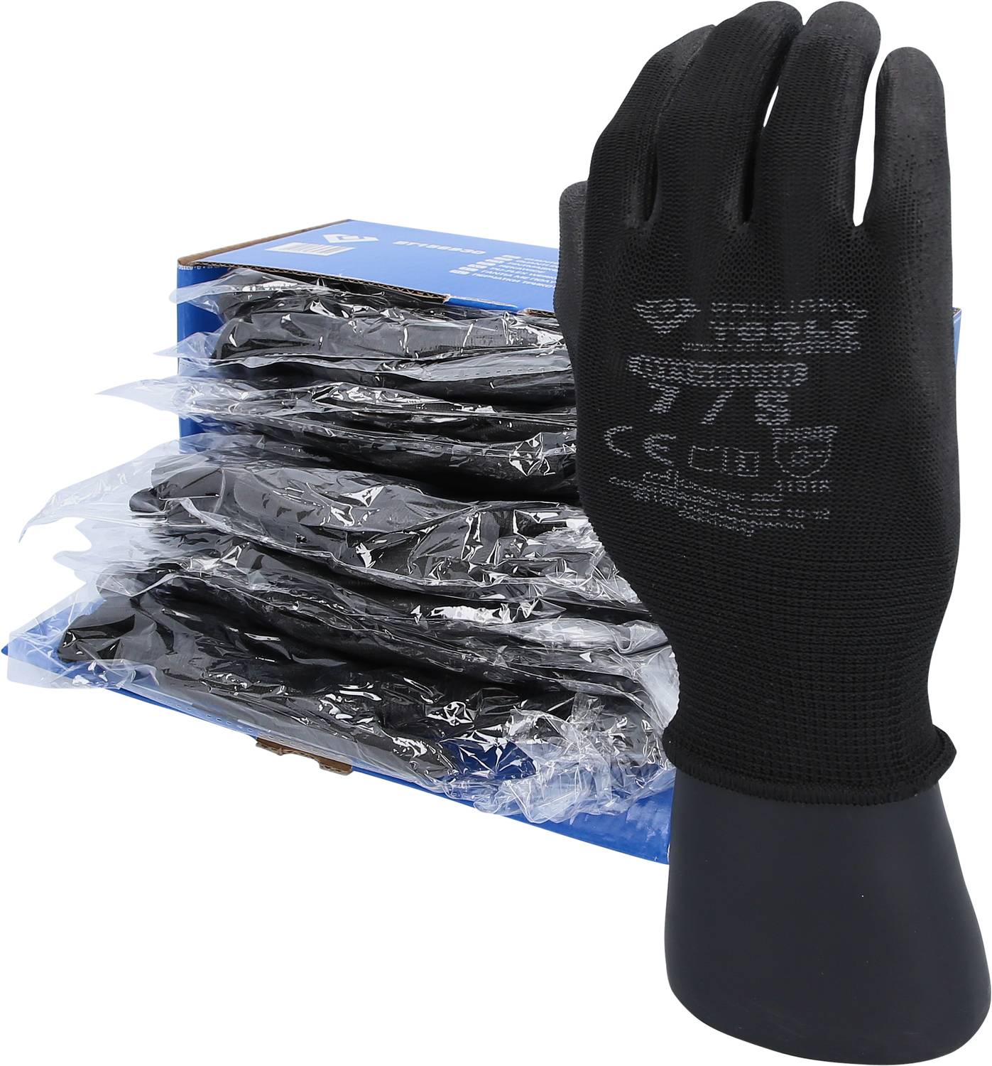 A black work glove on a display stand, with an open box containing several other packaged gloves beside it.