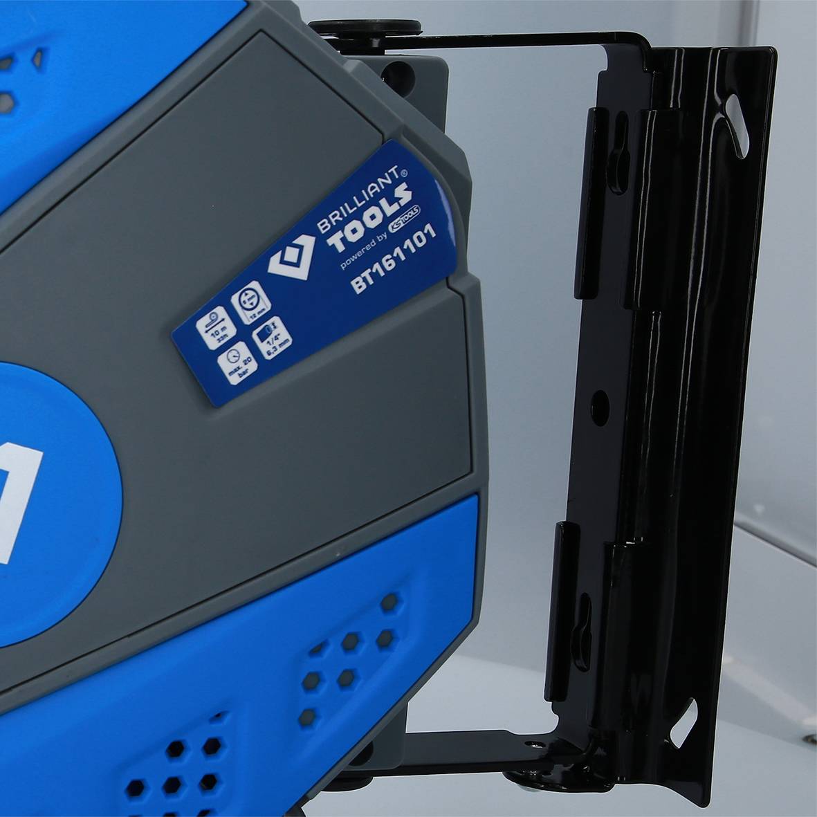 A blue cable reel from 'Brilliant Tools', model 'BT611101', mounted on a wall bracket.