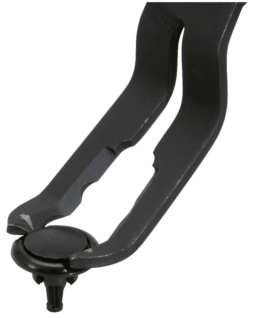 An installation tool holds a black plastic fastener, used in automotive manufacturing or for technical applications.