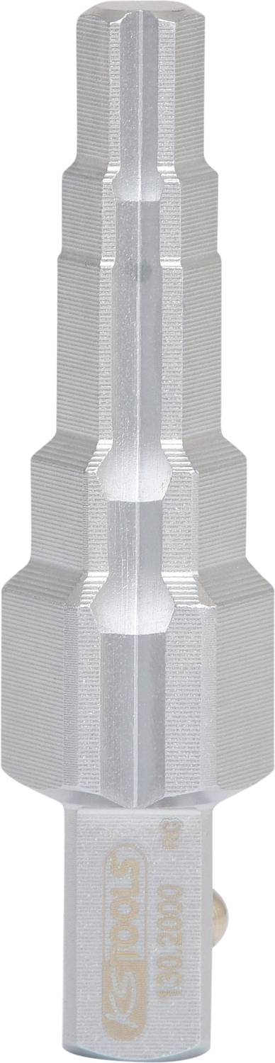Metal adaptor with multiple stepped segments. Used for connecting different pipe diameters in technical applications.