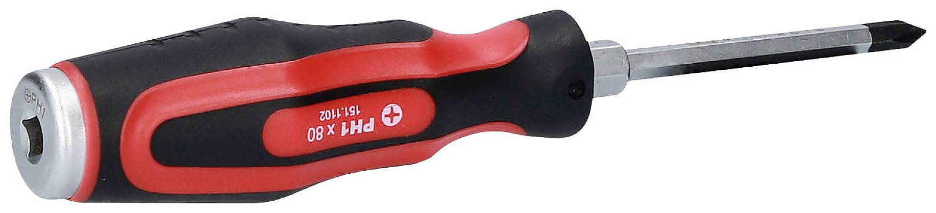 A red and black Phillips screwdriver is lying on its side.