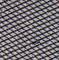 Close-up of a wire mesh. The wire threads are arranged diagonally and form a regularly repeated diamond pattern.
