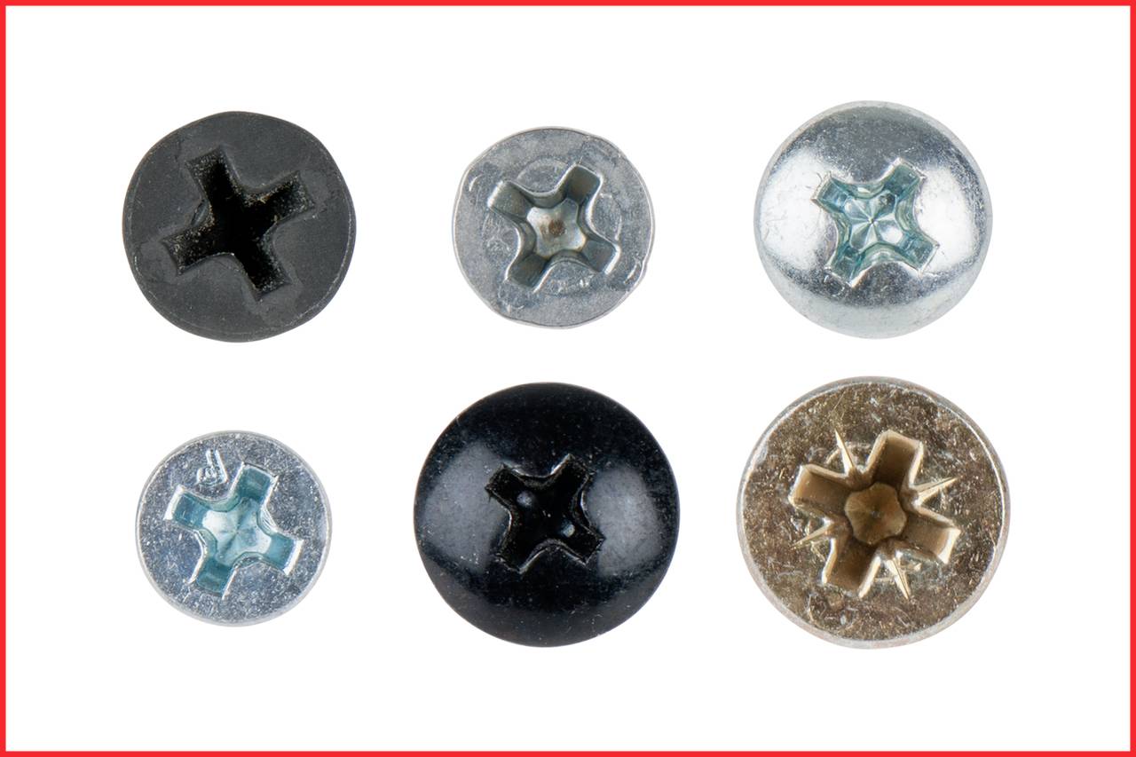 Six different screw heads arranged in two rows. Varying colours and patterns, including cross and star-shaped designs.