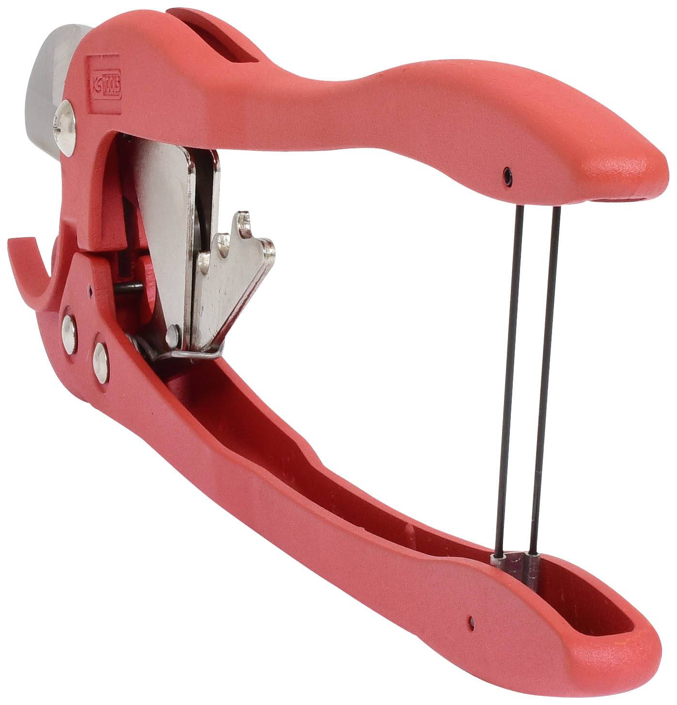 Red cherry stoner with handle and metal mechanism, used for removing stones from fruits such as cherries or olives.