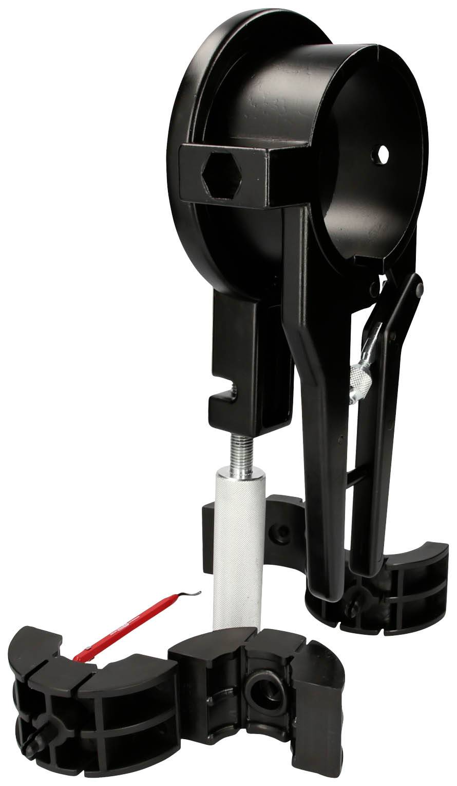 Black plastic tensioner with a round housing and two clamping pieces. Used for tensioning and securing ropes or cables.