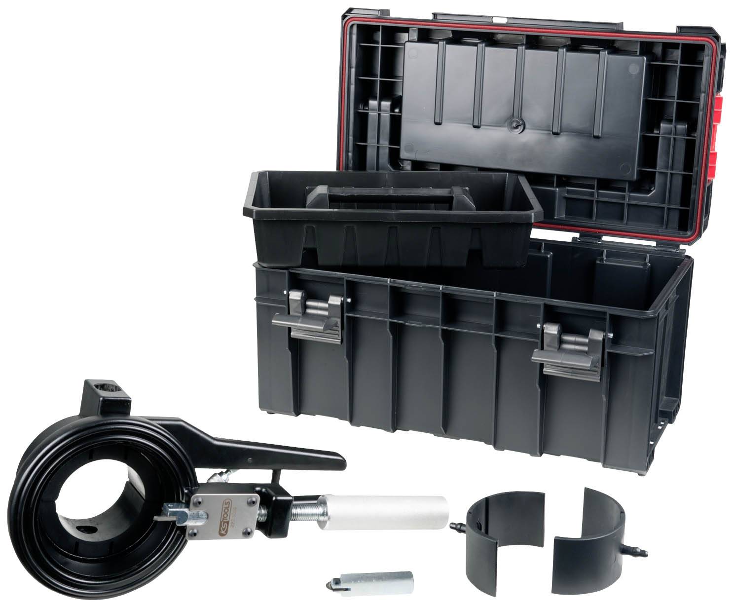Black tool case with open lid, removable compartment and various tools such as a cable crimper and rings.