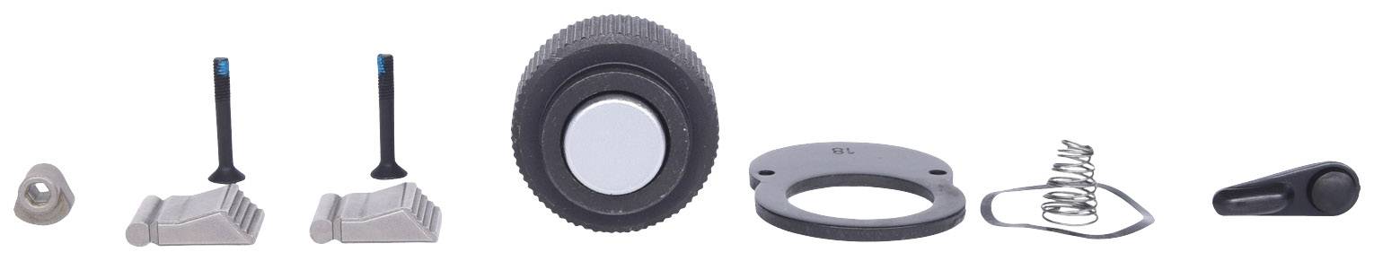 Car spare parts on a white background, including valves, handles, seals, and springs. Displays various vehicle components.