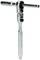 A silver ratchet spanner with an extended handle and lever mechanism for precise screw or bolt adjustment in workshop environments.