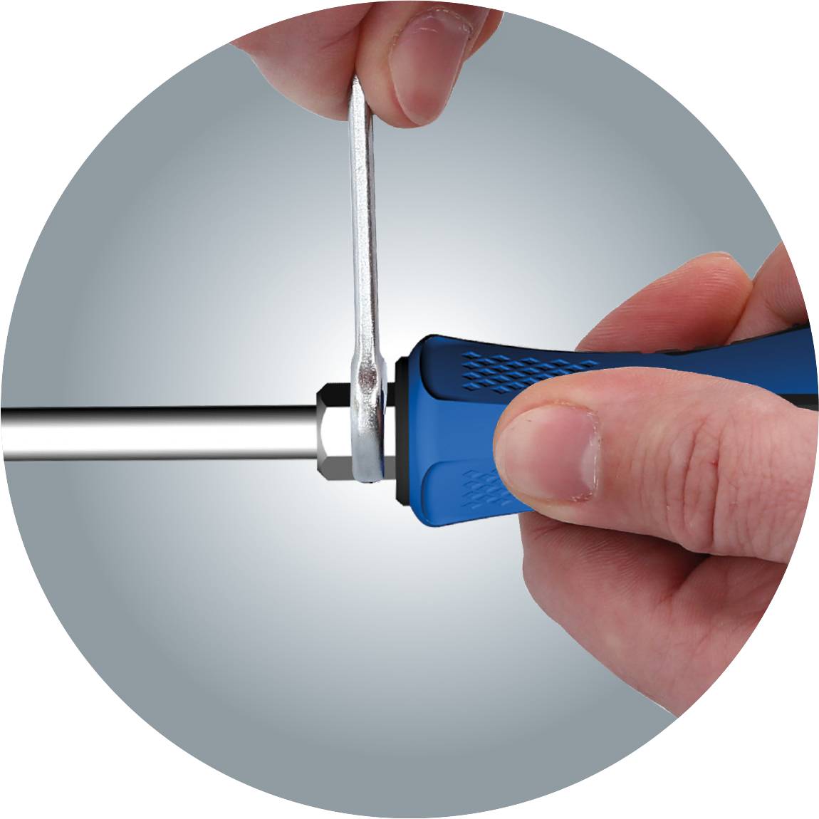 A person is holding a blue screwdriver and tightening a screw with a spanner.