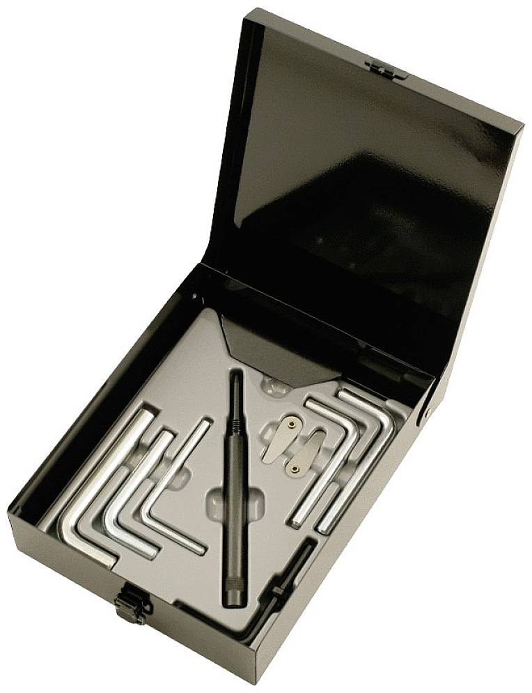 An open black case containing various hex keys, a screwdriver, and small accessories.