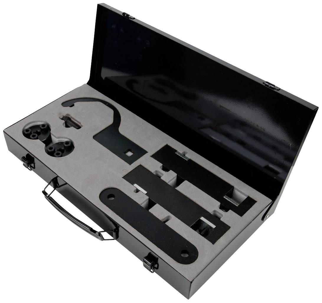 An open black suitcase with various mechanical tools and attachments placed in special compartments.